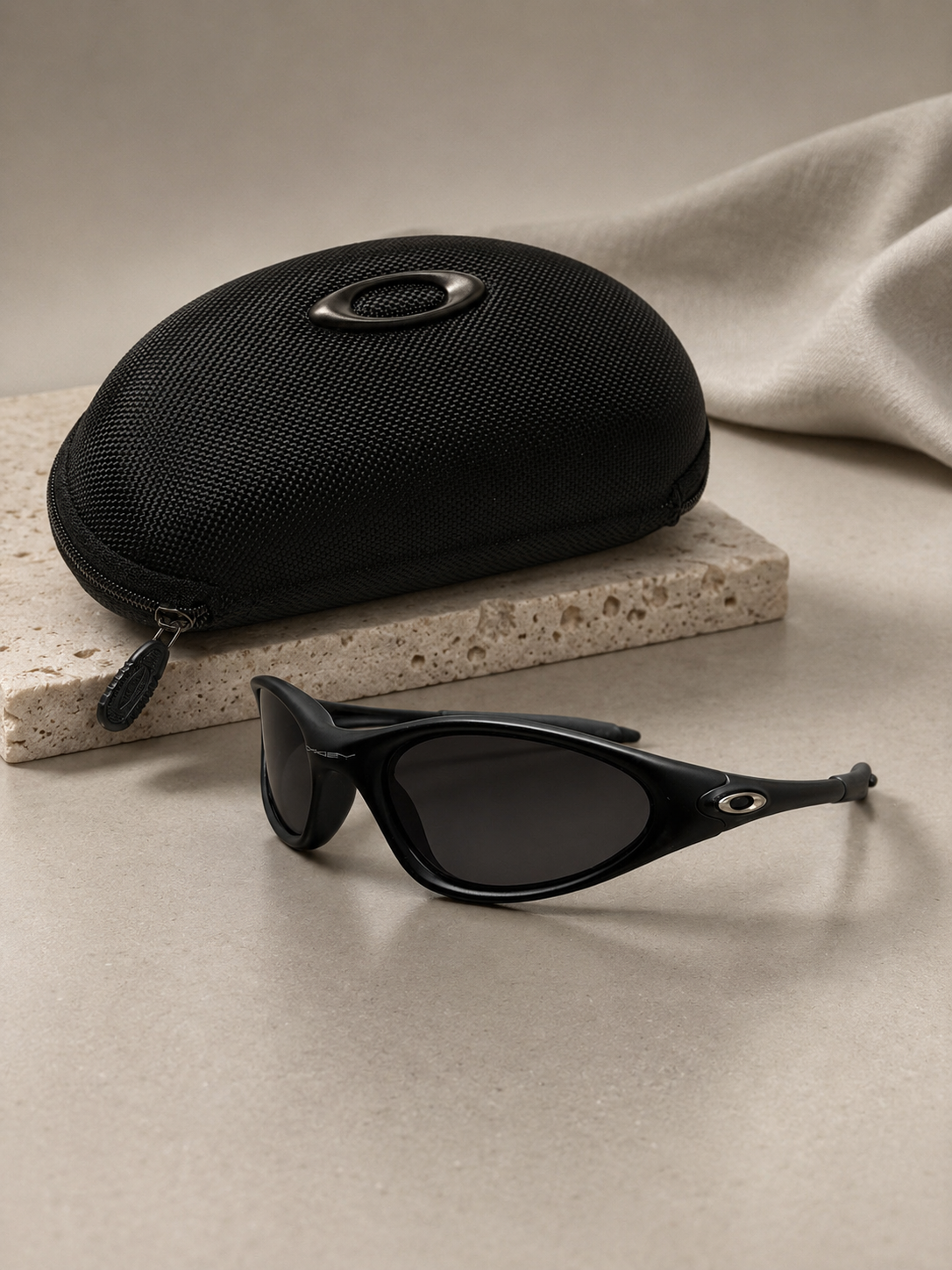 Oakley Minute 1.0 — Matte Black / Black Lens